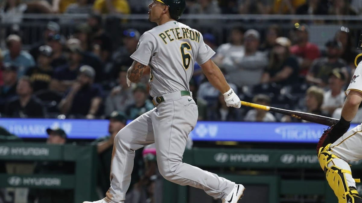 A's sock four homers, batter Pirates to end skid