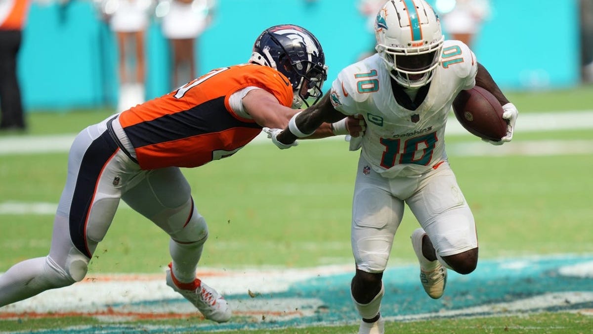 Dolphins score 70 in win over Broncos, Sports