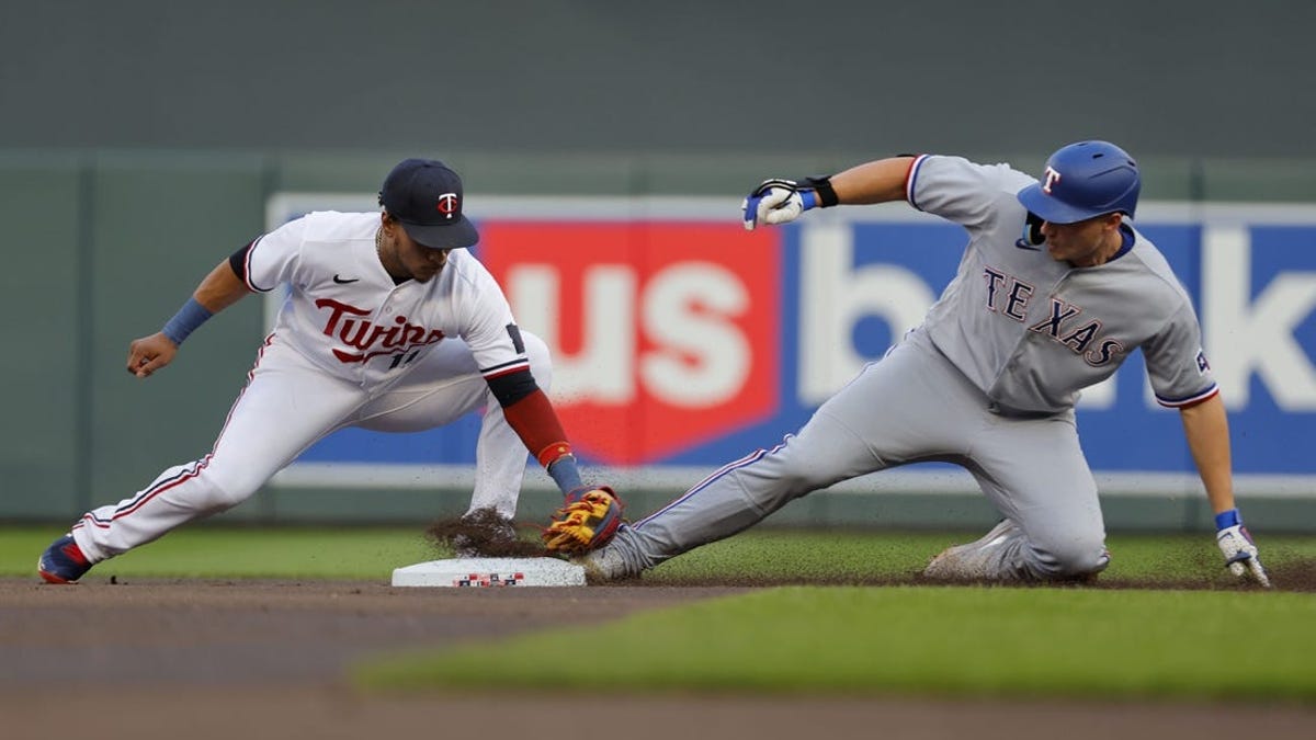 Minnesota Twins' Max Kepler reacts after striking out to end the bottom of  the eighth inning of a baseball game against the Texas Rangers Monday, Aug.  22, 2022, in Minneapolis. (AP Photo/Abbie