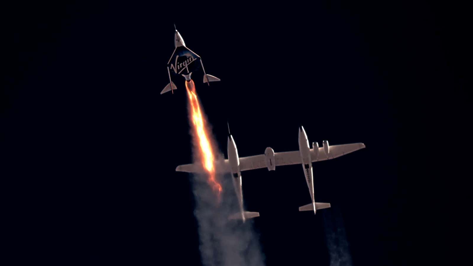 Virgin Galactic’s rocket plane takes flight with founder Richard Branson onboard.