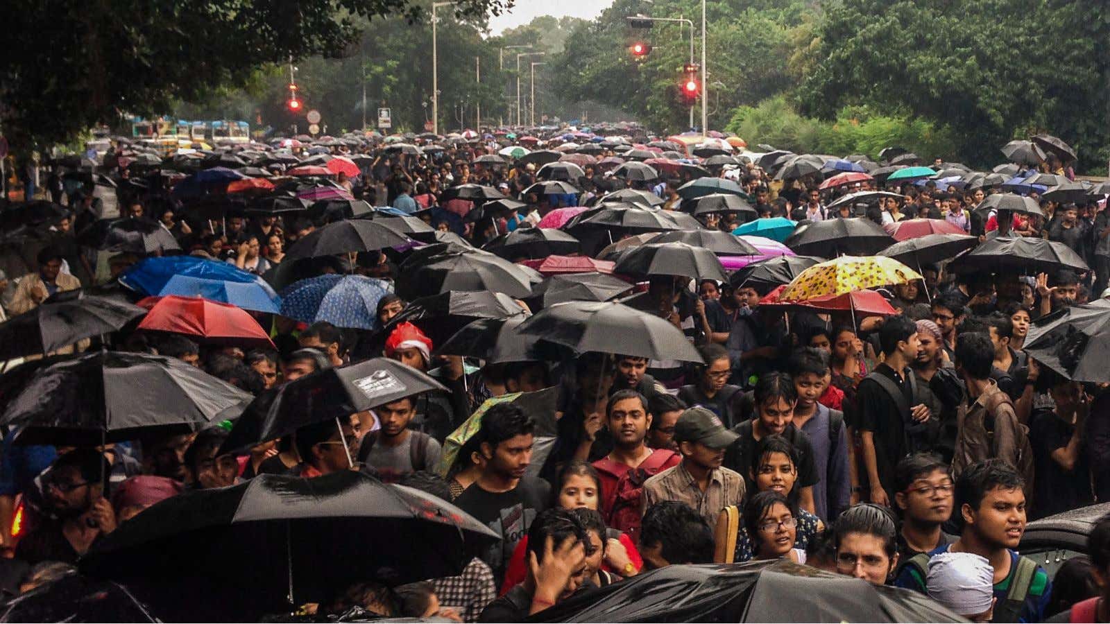 Thousands march down central Kolkata on 20 September 2014.