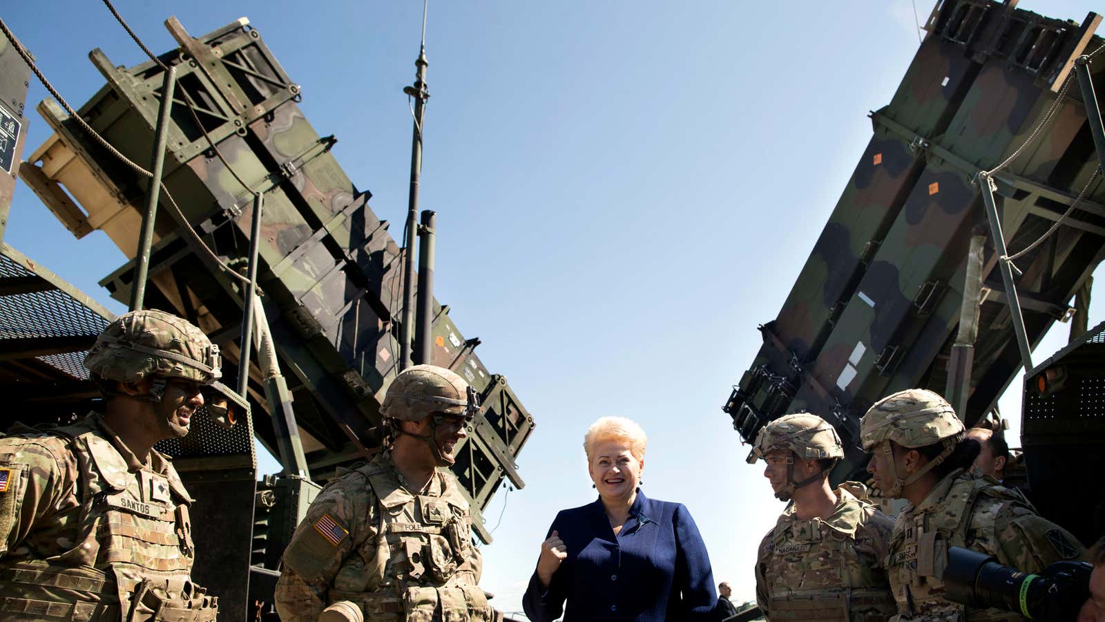 Would Lithuania’s president be so pumped if she knew the Patriot’s record?