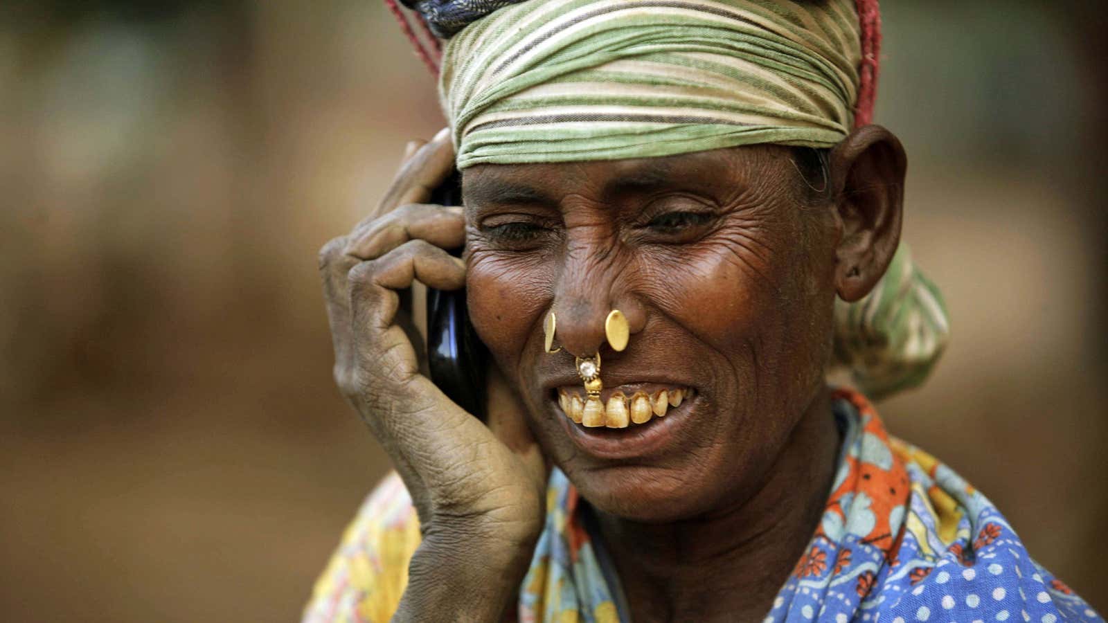 One of the six billion people on earth with a mobile phone. Far fewer have access to clean toilets.