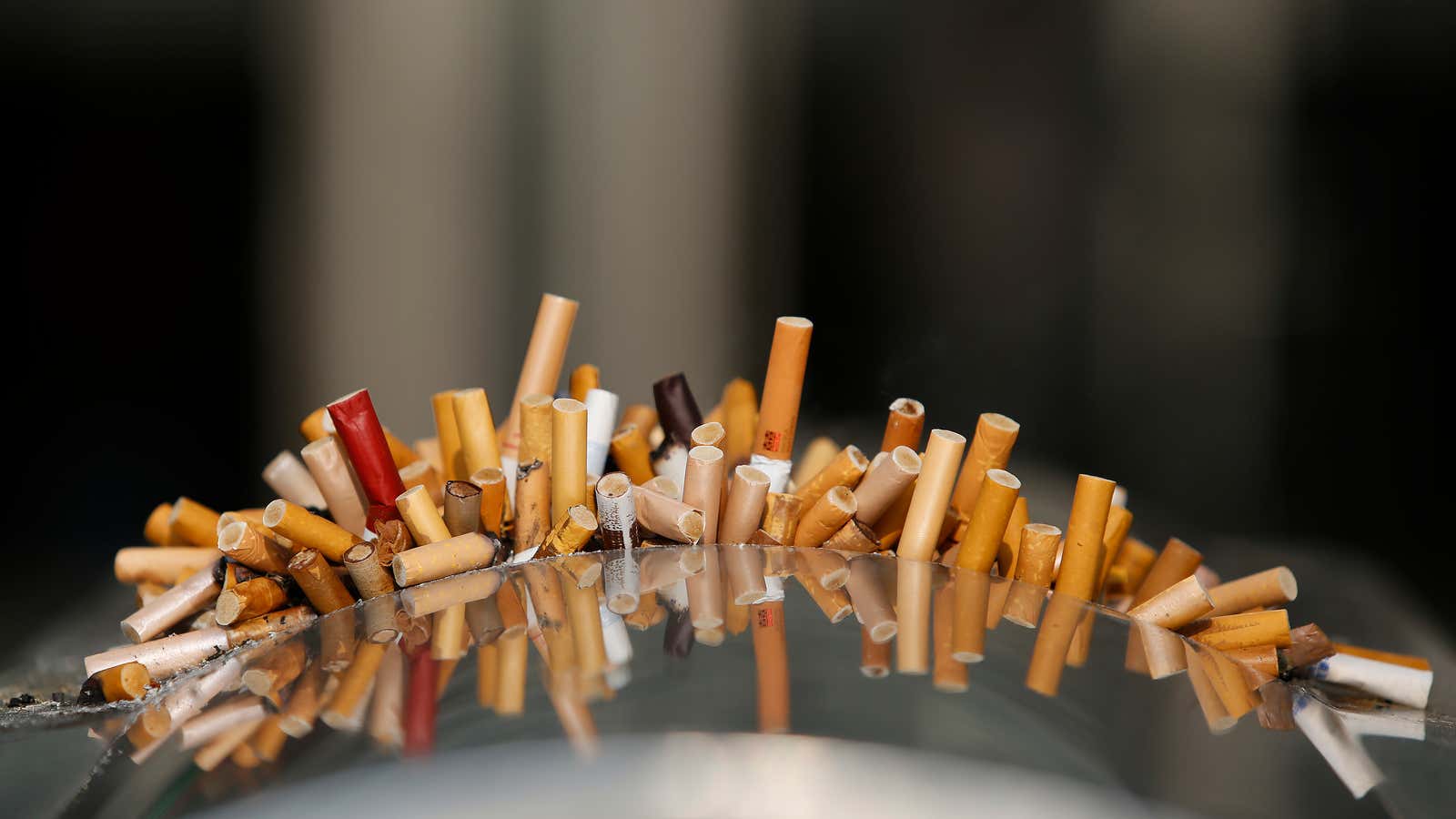 Extinguished cigarettes are seen in an ashtray at the Shanghai Railway Station