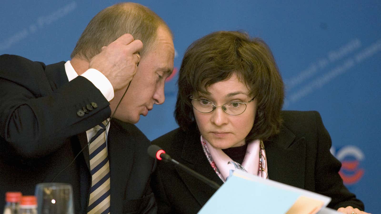 Vladimir Putin offers some advice to Russia central bank governor Elvira Nabiullina.