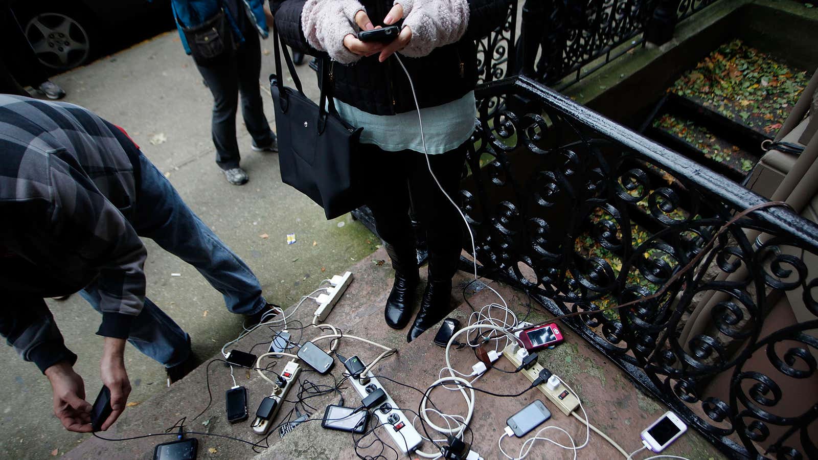 A good samaritan provides electricity for storm victims to charge electronic devices in Hoboken, New Jersey.