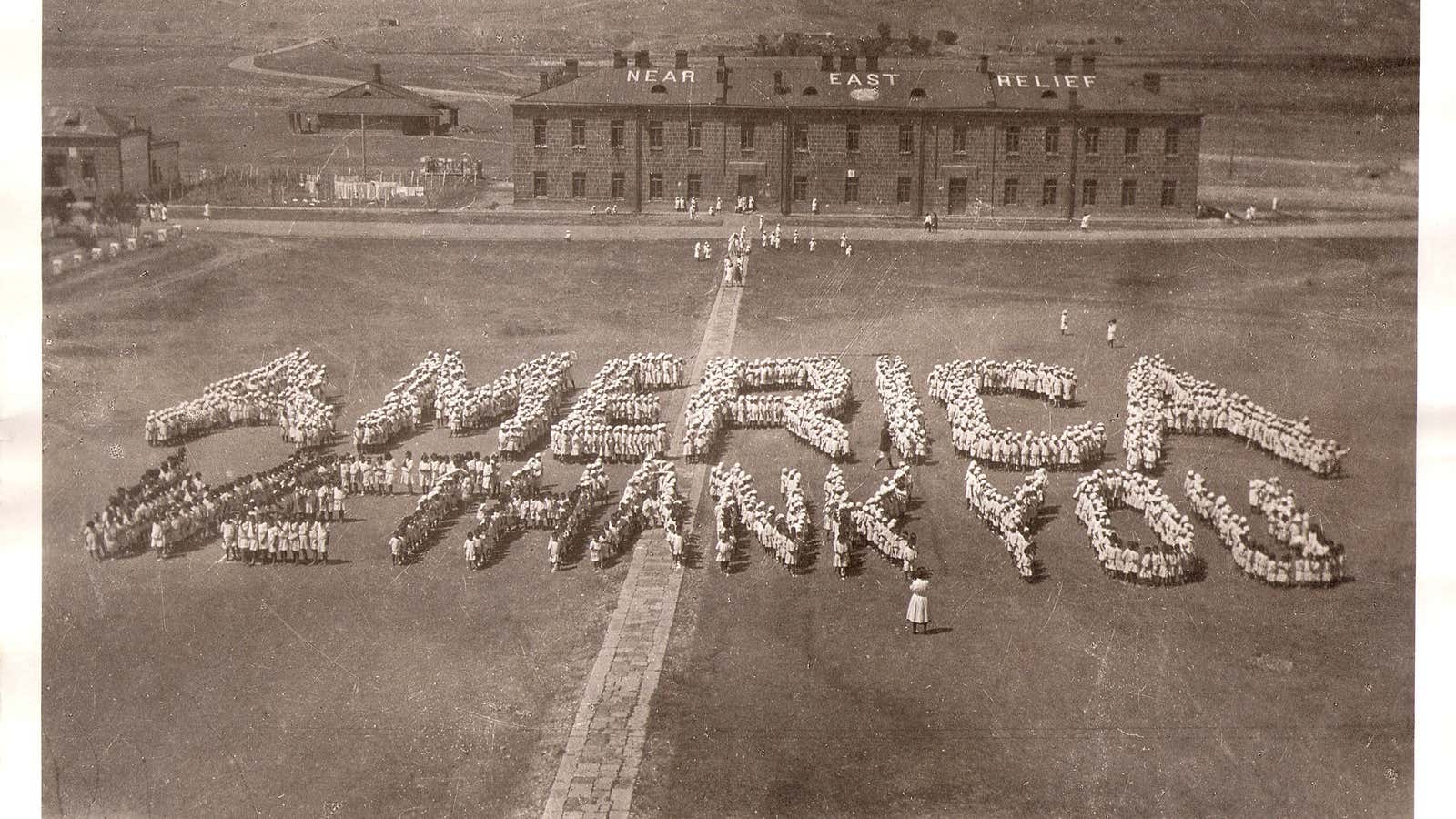 Orphans at Near East Relief Alexandrapol (today’s Gyumri, Armenia) spell out “America We Thank You.”