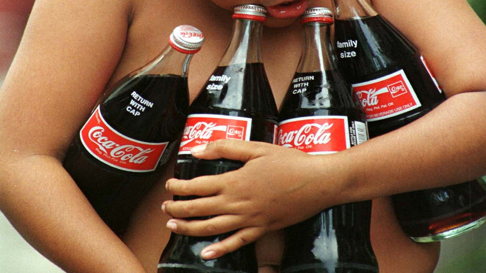 A heavy tax burden could lead bottlers to take the cane sugar out of Mexican Coke .