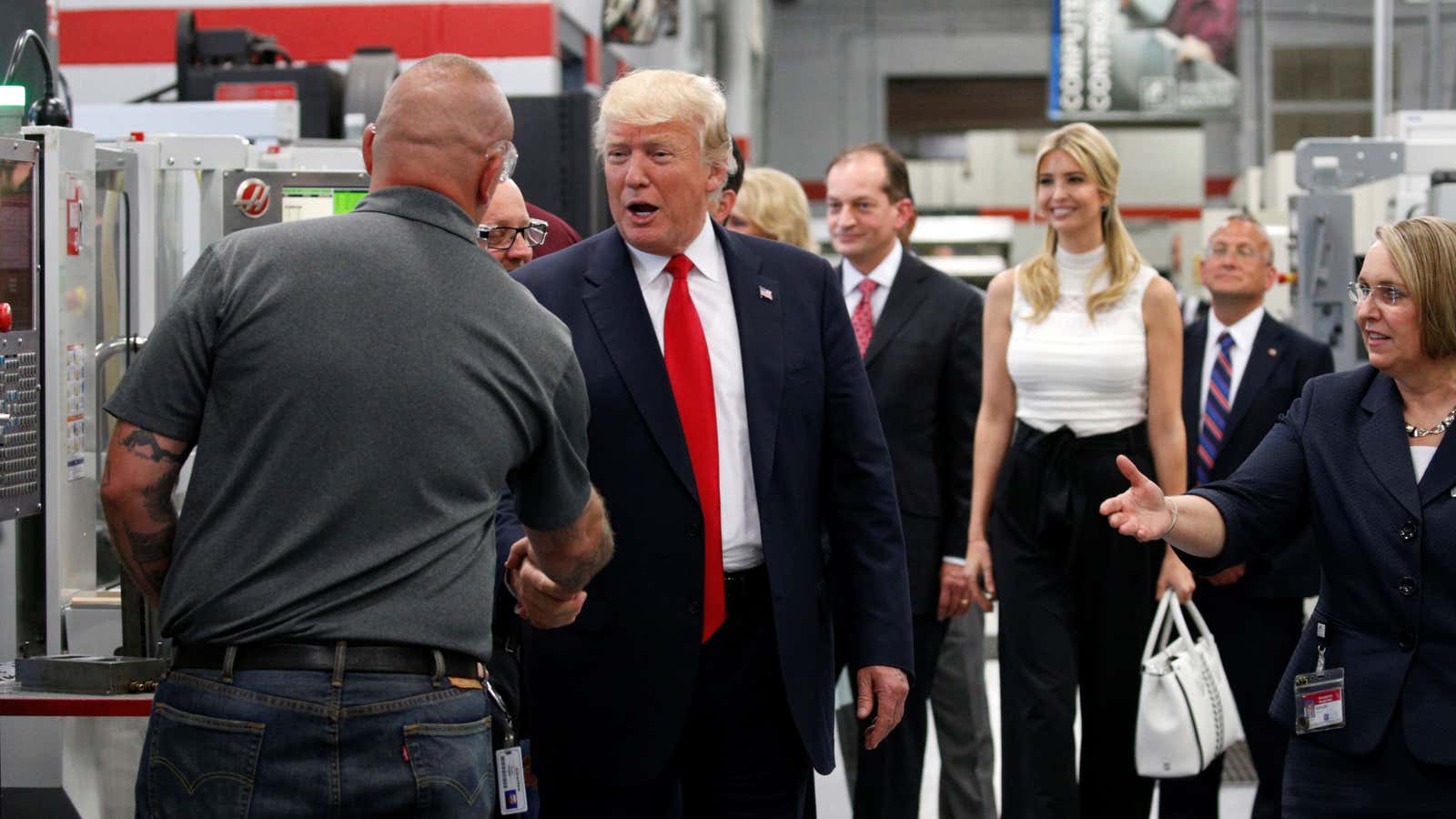 U.S. President Donald Trump shakes hands as he tours Waukesha County Technical College as part of “workforce development week.”