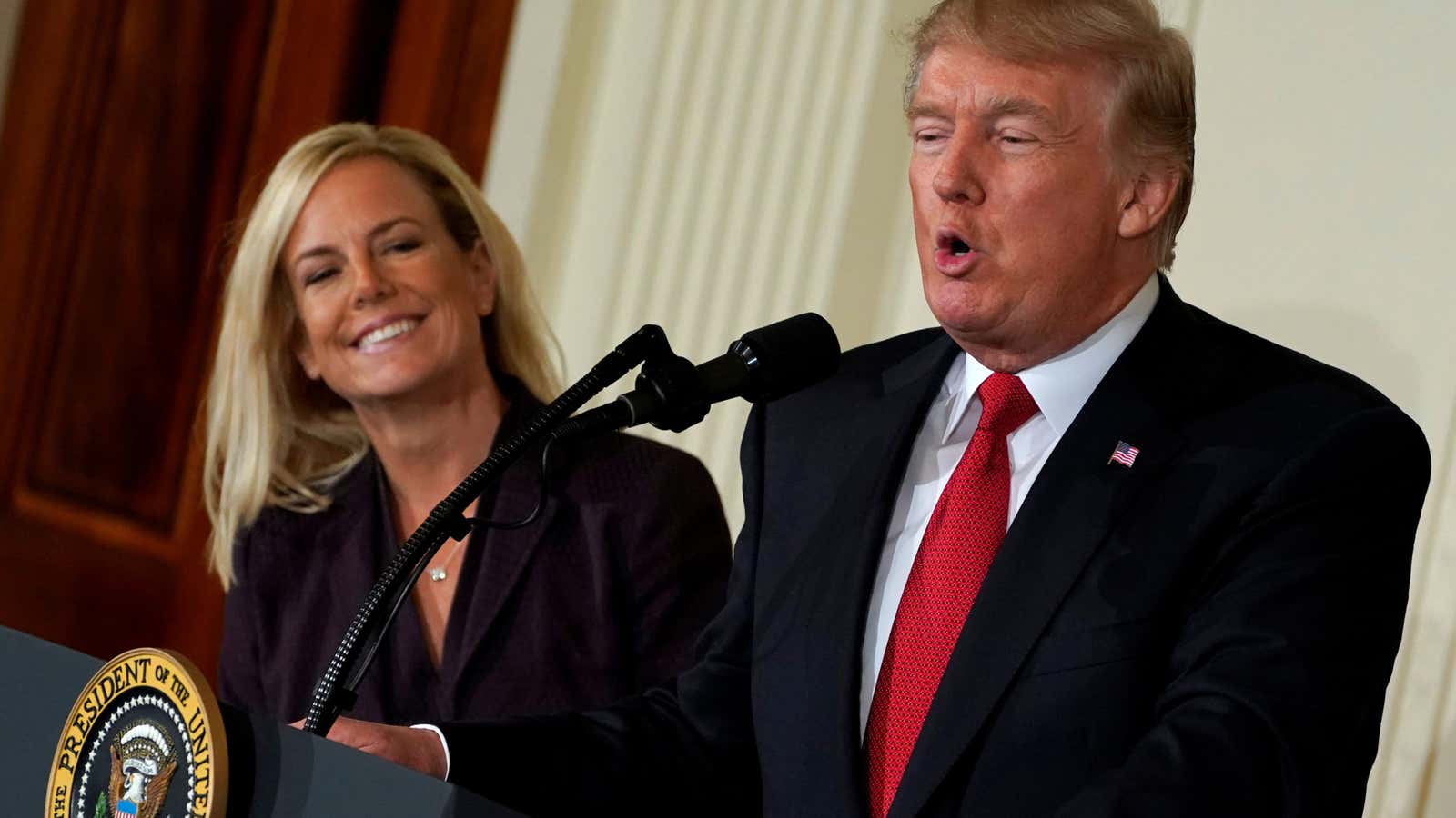 Trump praises Kirstjen Nielsen at a White House reception for her on Oct. 12.