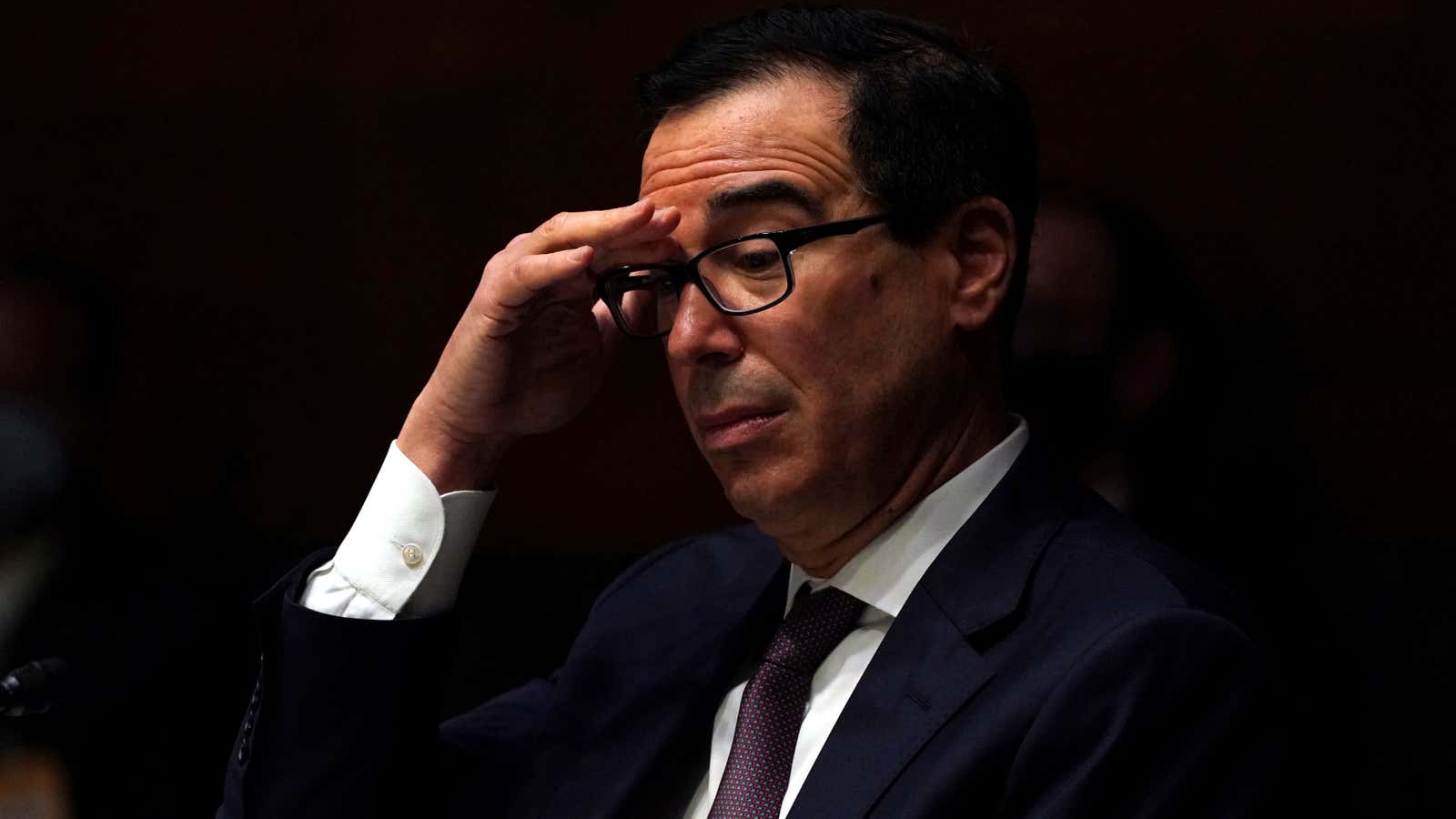 US Treasury secretary Steven Mnuchin talks to lawmakers about the CARES Act.