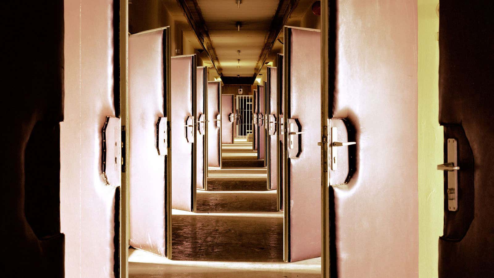 “Hohenschönhausen Vernehmertrakt 1” (detail). A hallway in a Stasi prison leads to interrogation rooms.