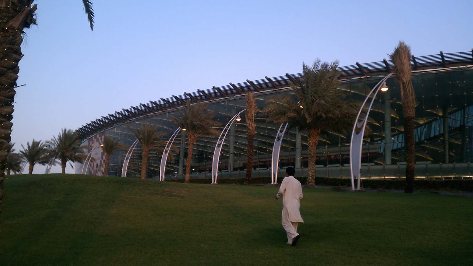 A man walks in front of the Mall of Arabia in Jeddah, Saudi Arabia.