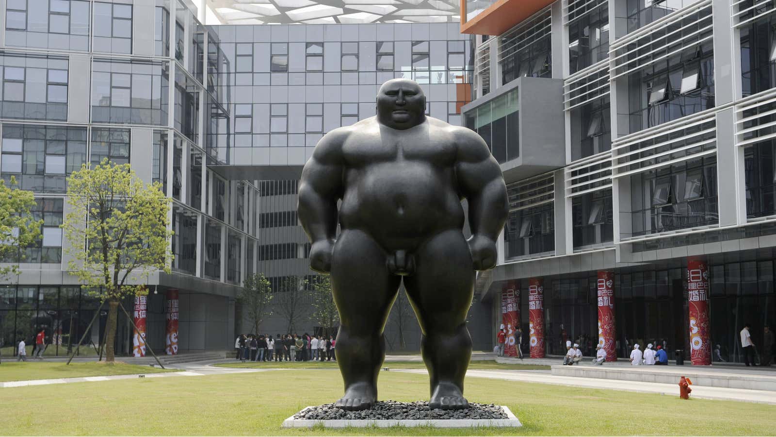 Like this statue at its headquarters, Alibaba is giant.