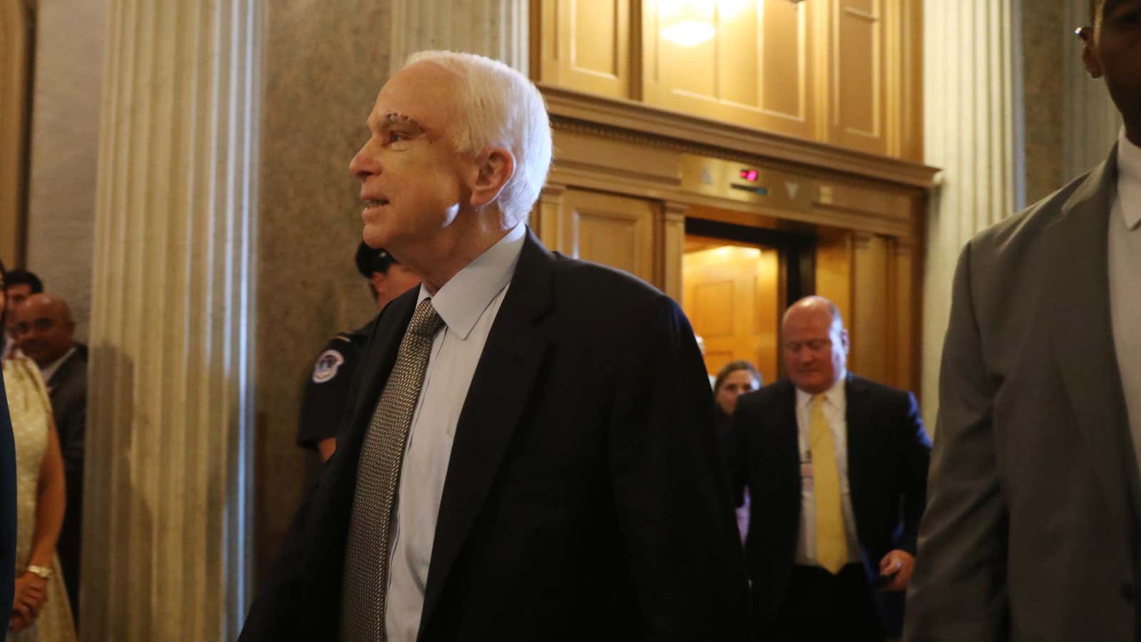 McCain arrives in the Senate.