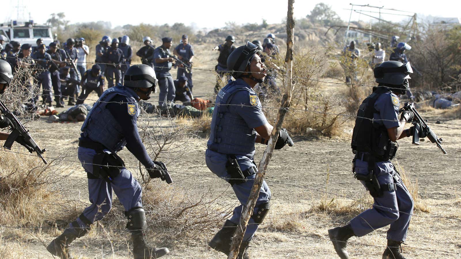 South African police taking on protesting miners on Aug 16, 2012 at Marikana mine