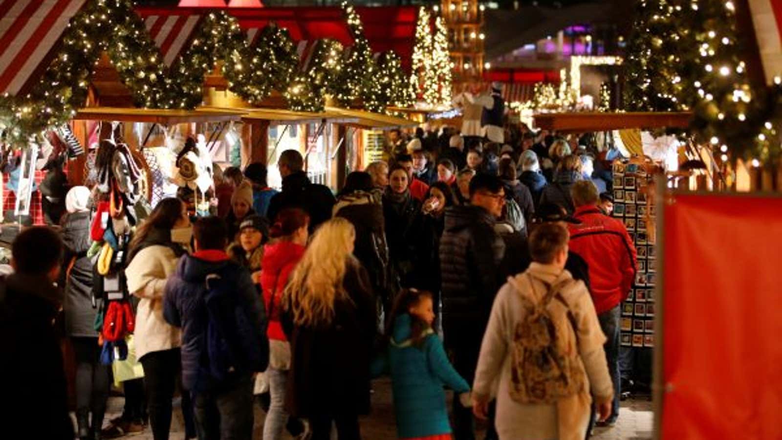 People visit the Christmas market near Alexanderplatz square in Berlin, Germany, November 23, 2016.