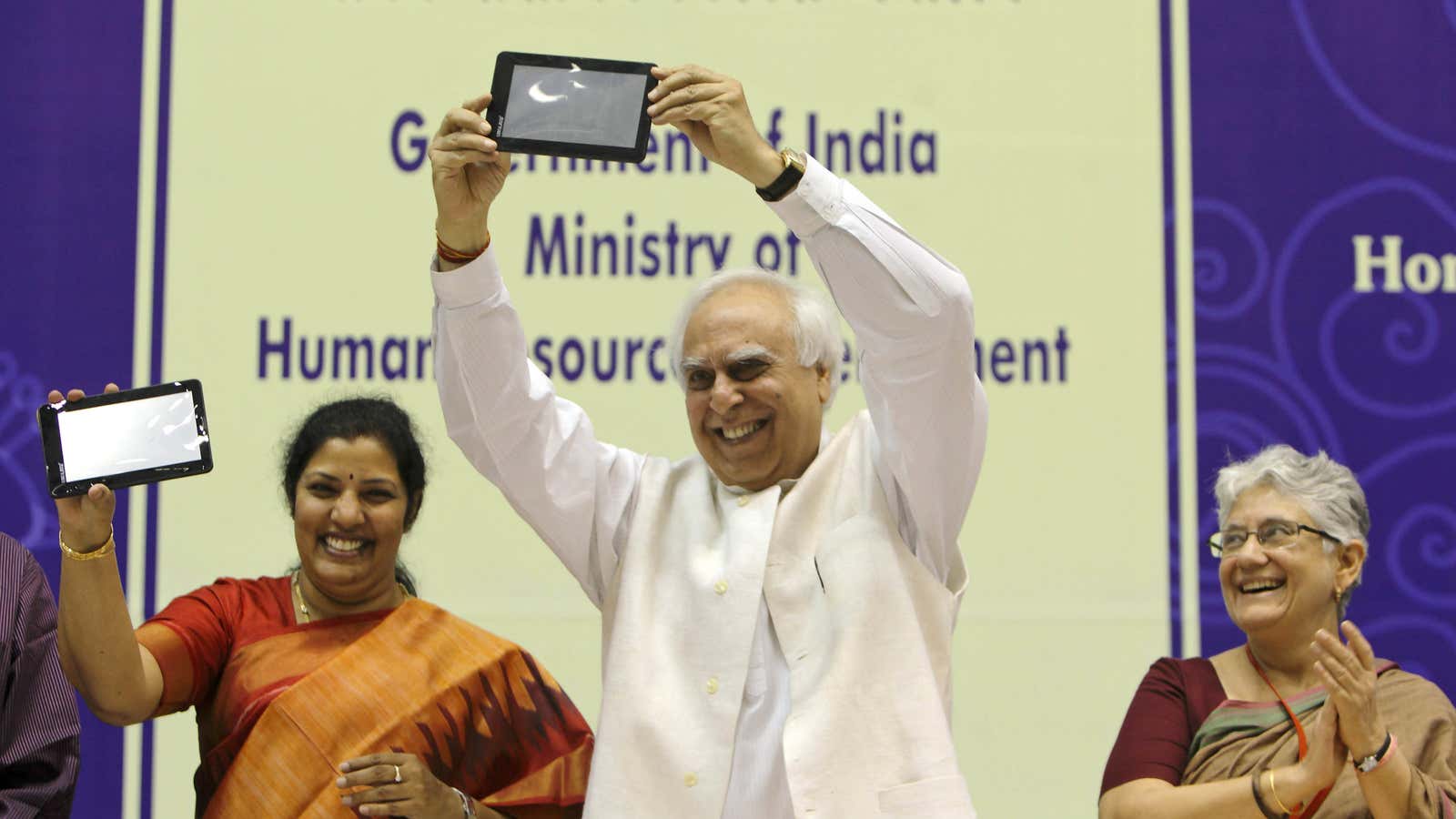 During less troubled times for India’s cheap tablet, minister Kapil Sibal lofted the Aakash in 2011.