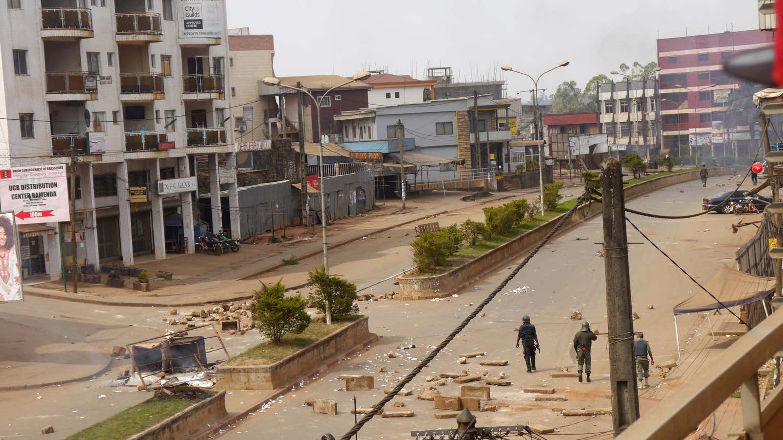 Soldiers clear a road in Bamenda, Cameroon after last December’s protests.