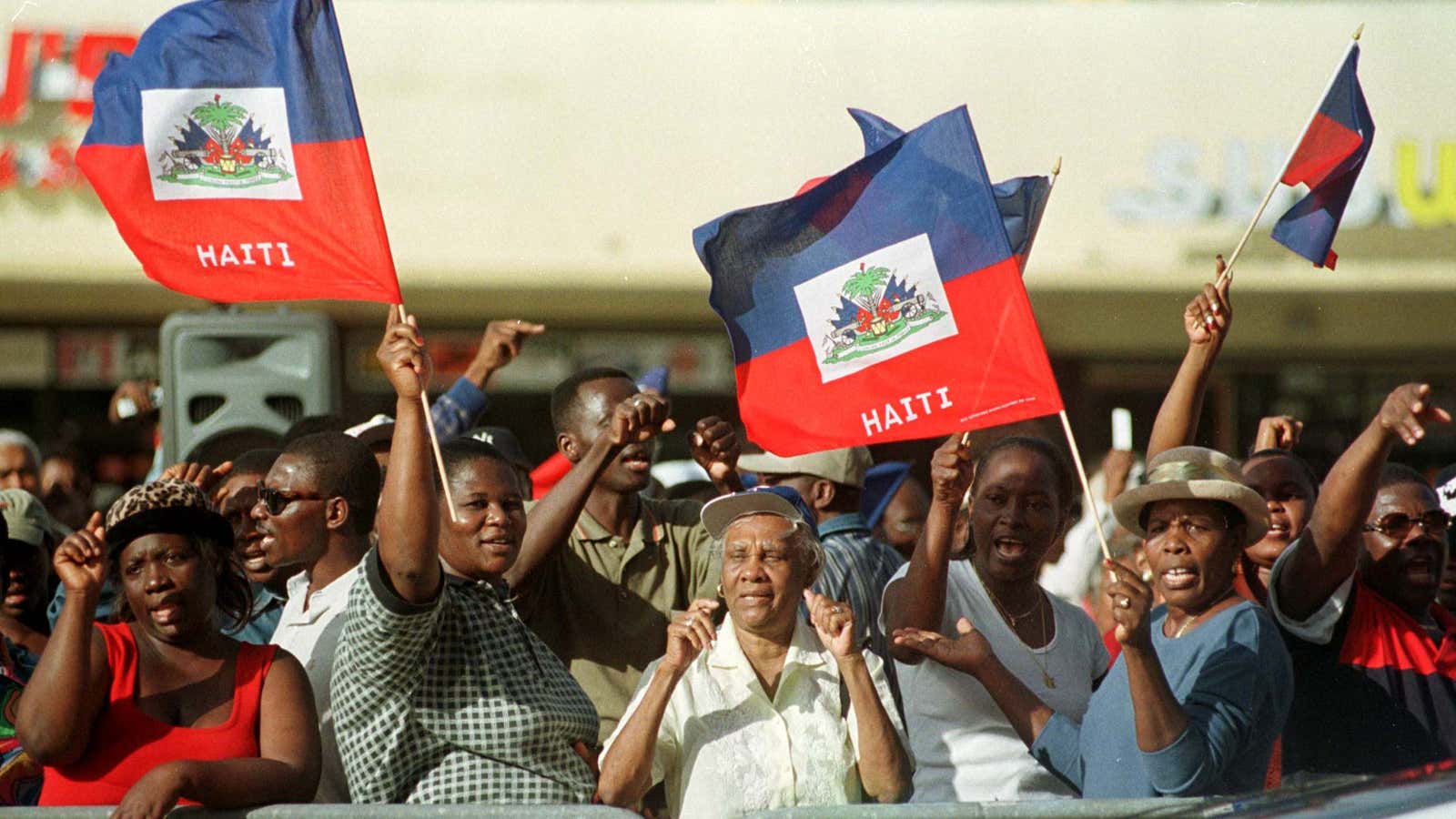 Haitian-Americans protest in front of a US Immigration facility in Miami January 3.