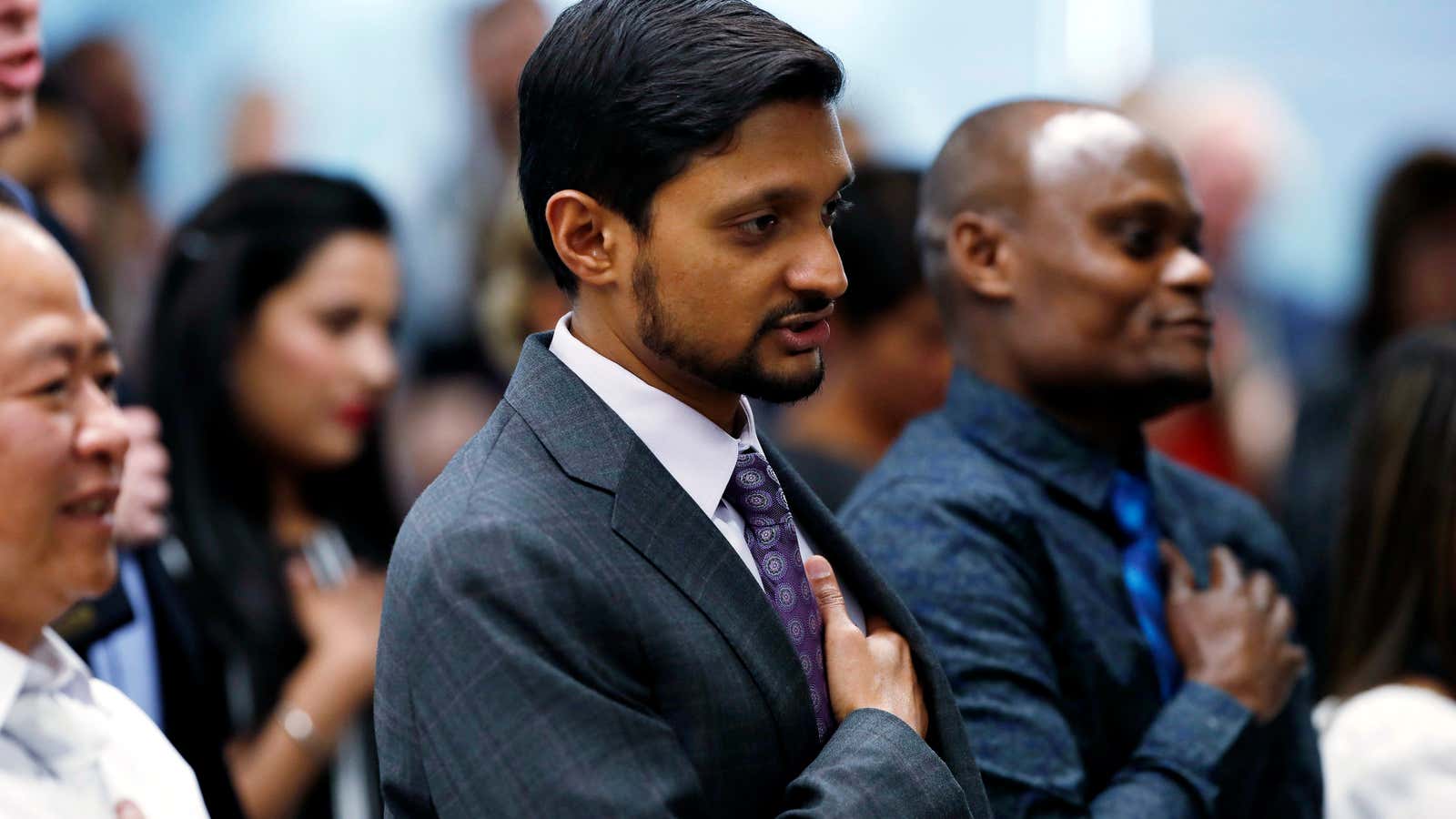 Immigrants to the US at a naturalization ceremony in May 2019.