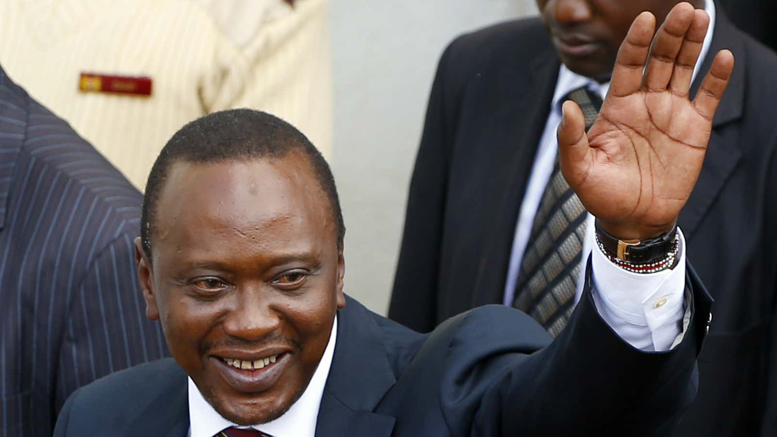 Kenyan president Uhuru Kenyatta waves to supporters shortly after being elected.