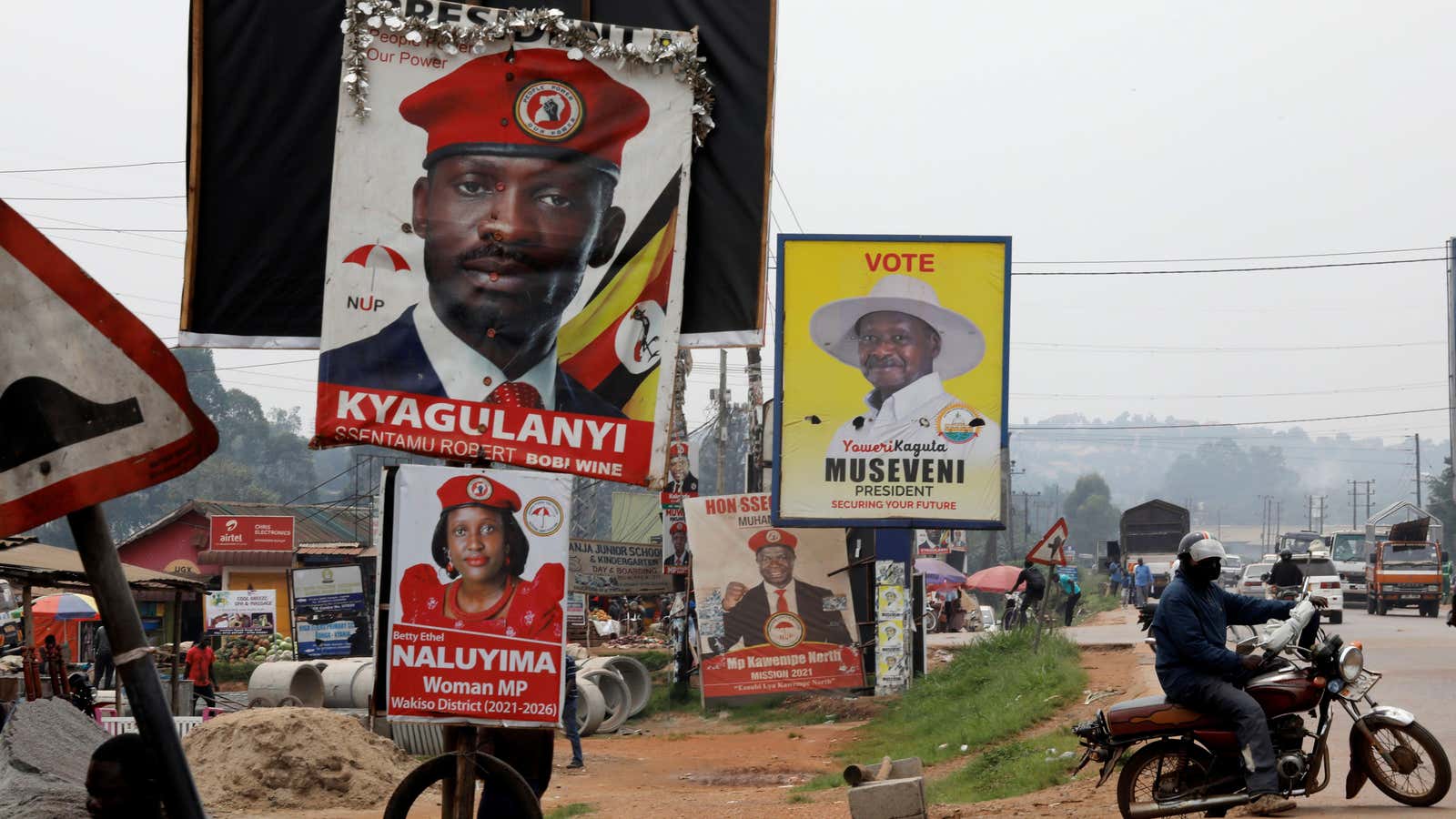 Elections billboards for Uganda’s president Yoweri Museveni, and opposition leader Robert Kyagulanyi, also known as Bobi Wine in Kampala, Uganda January 12, 2021.
