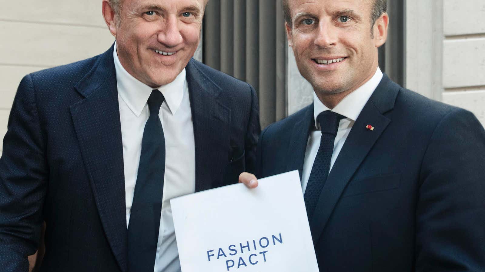 François-Henri Pinault, CEO of Kering, with French president Emmanuel Macron.