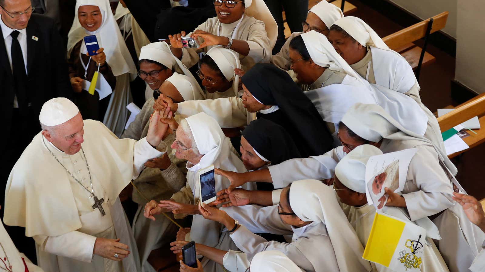 Pope Francis greets faithful after leading the mid-morning prayer at the Monastery of the Discalced Carmelites in Antananarivo, Madagascar, Sep.7.