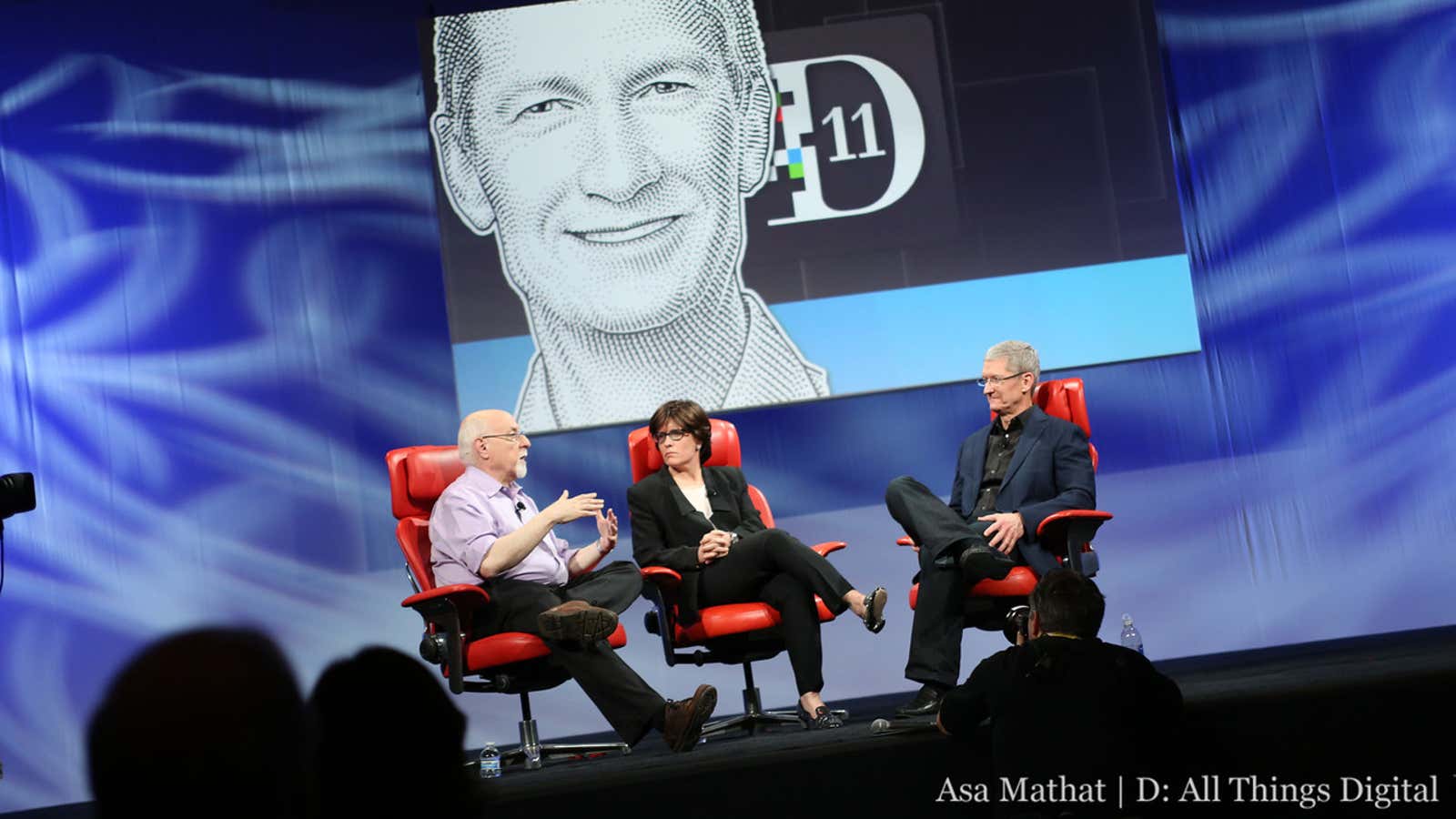 Mossberg and Swisher onstage earlier this year with Apple CEO Tim Cook.