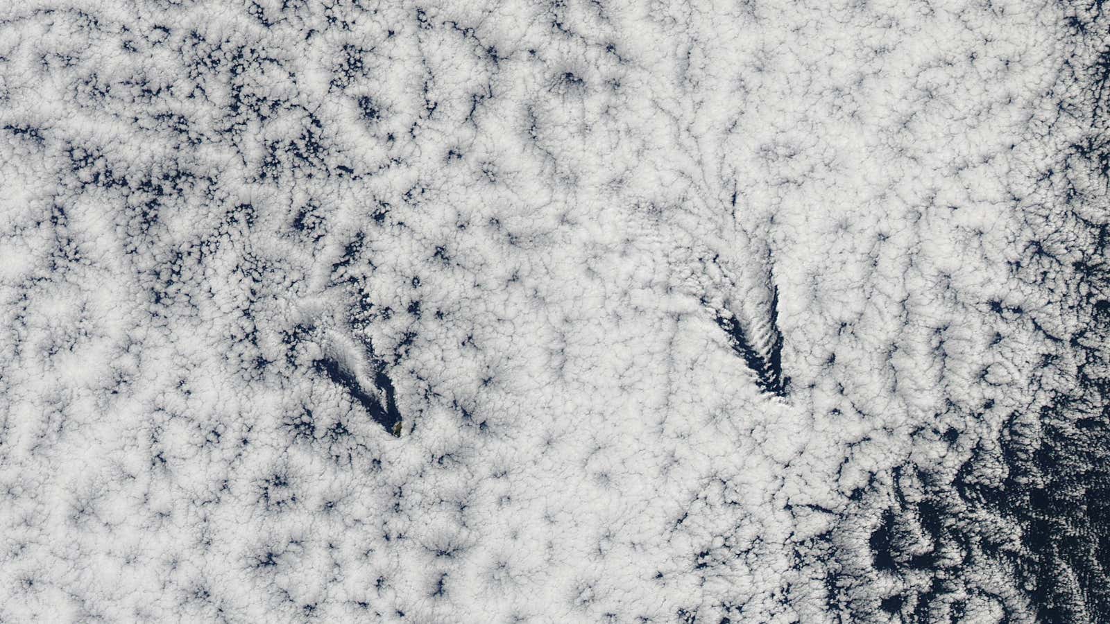 A view of the Juan Fernandez Islands cutting through the clouds, taken  700 km up.