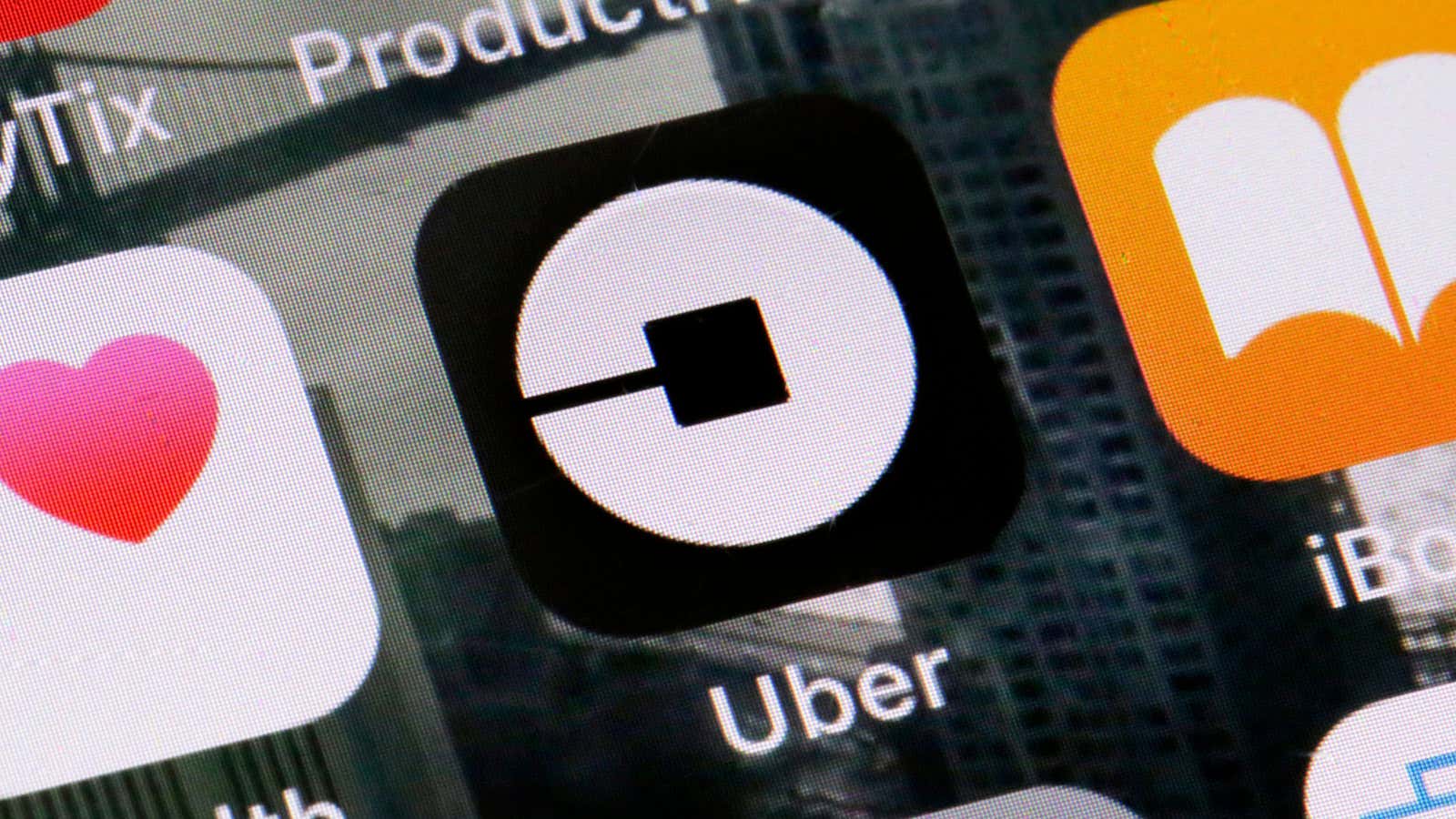 FILE – This Tuesday, June 12, 2018, file photo shows the Uber app on a phone in New York. On Monday, July 9, 2018, Uber…