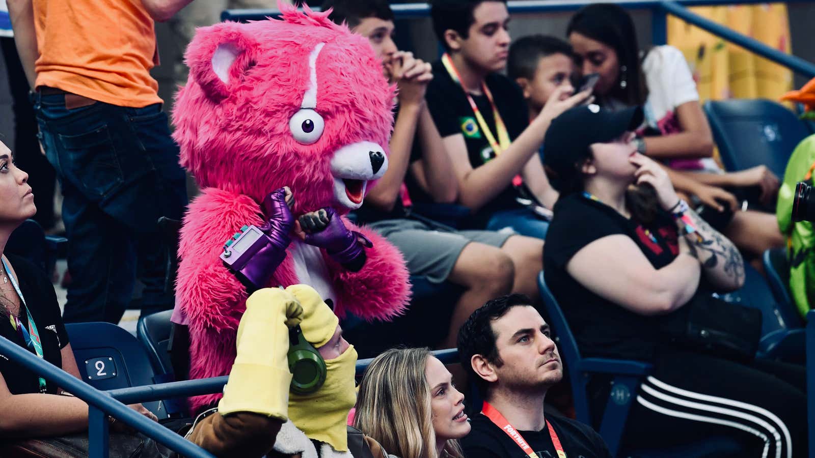 Fortnite characters and fans at the World Cup Finals esports event at Arthur Ashe Stadium in New York.