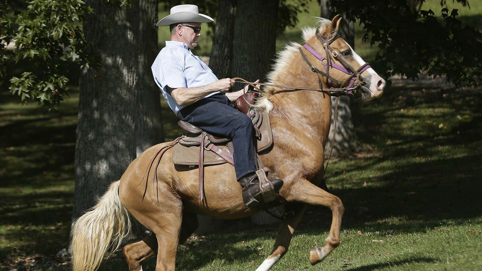 Moore rides in to vote for himself.