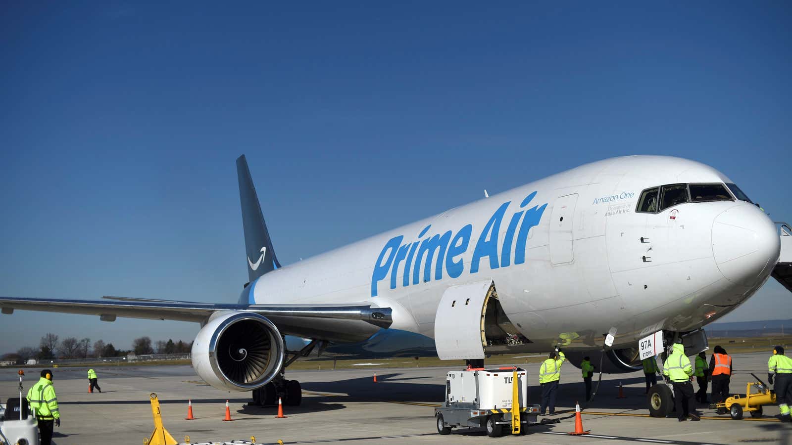 A wide body aircraft emblazoned with Amazon’s Prime logo is unloaded at Lehigh Valley International Airport in Allentown, Pennsylvania.