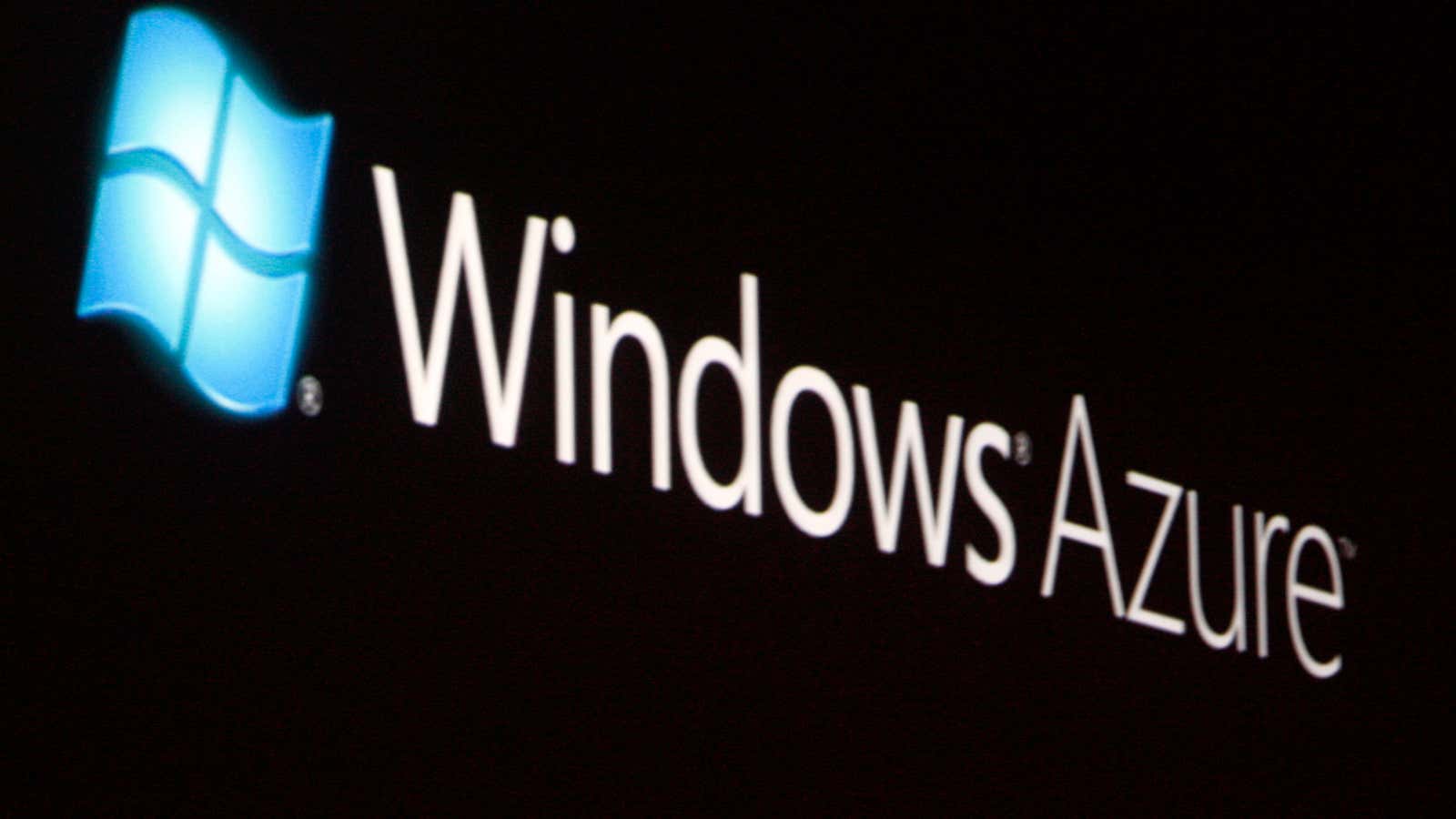 The launch of Windows Azure, with its logo shown on a screen, is announced by Chief Software Architect at Microsoft Ray Ozzie at the 2008…