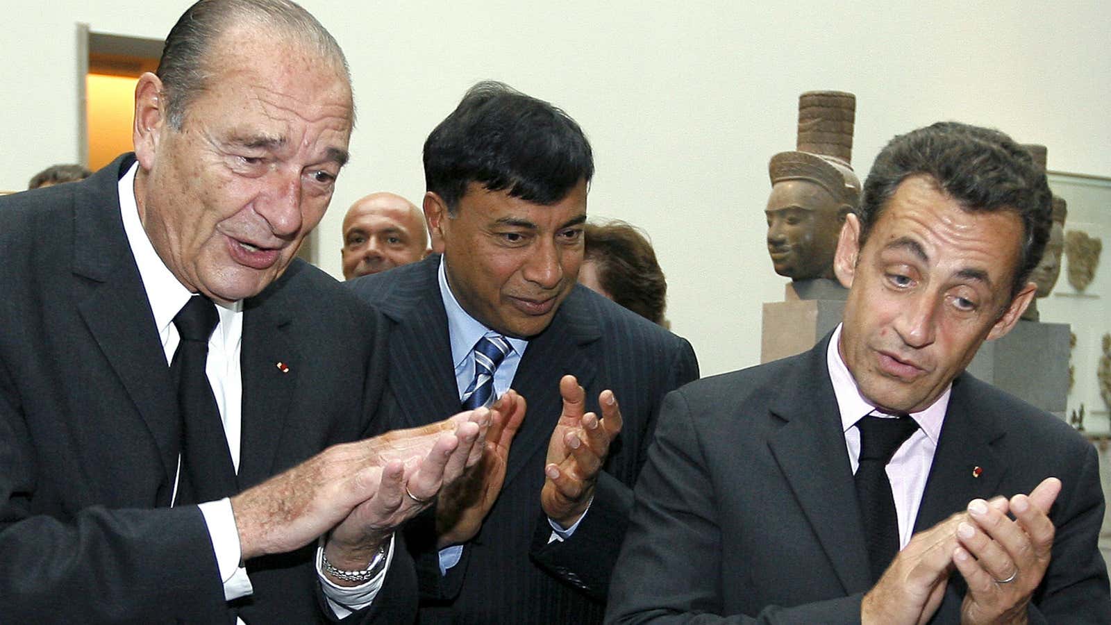 These are the French presidents Lakshmi Mittal, center, must be missing now.