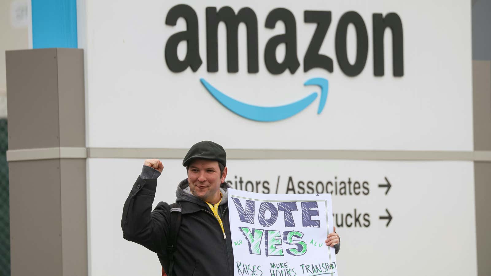 An Amazon Labour Union (ALU) organizer stands outside Amazon’s LDJ5 sortation center, as employees begin voting to unionize a second warehouse in the Staten Island…