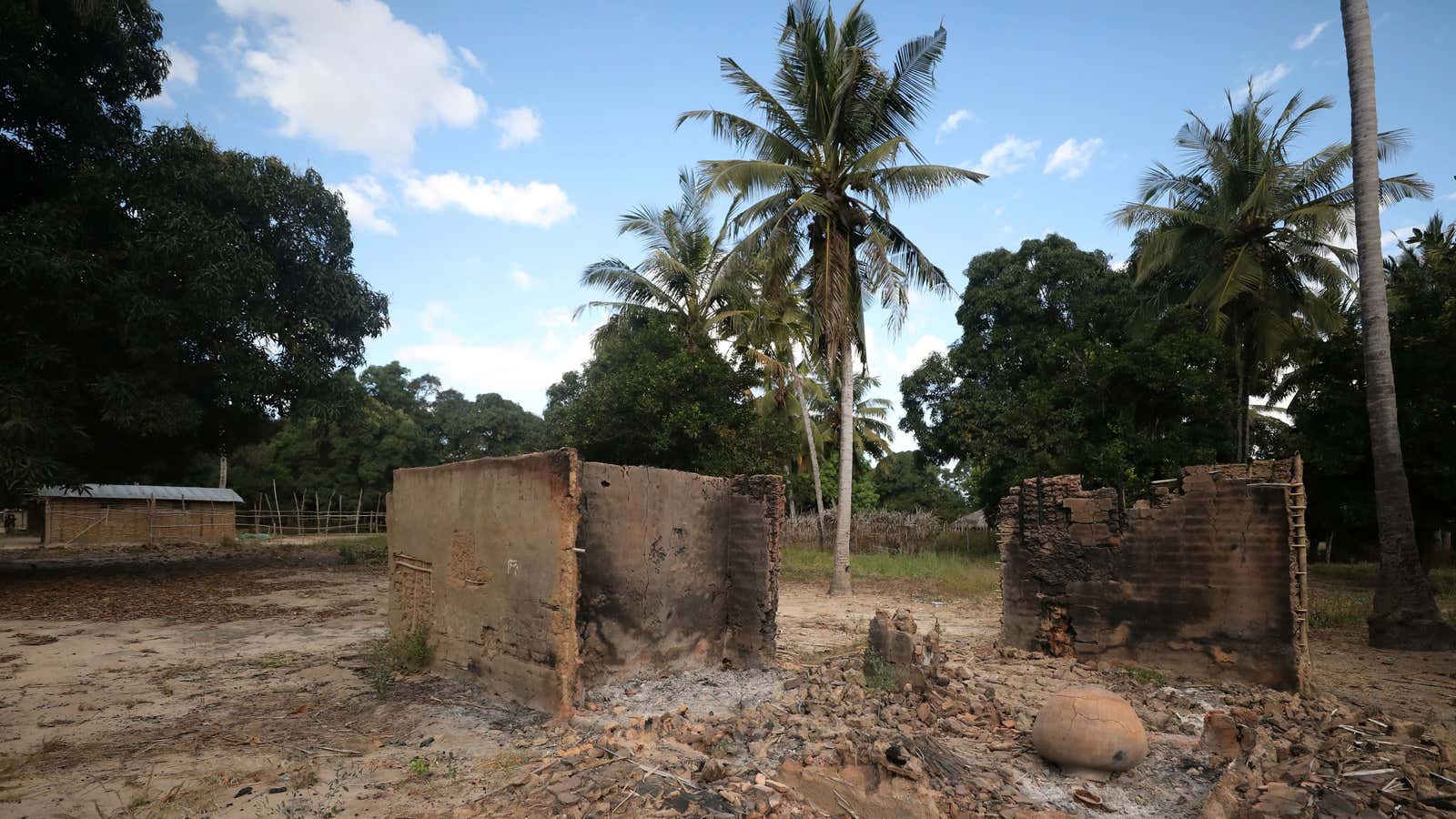 Burnt-out huts are seen at the scene of an armed attack by Islamist terrorists in Chitolo village, Mozambique, July 10, 2018.