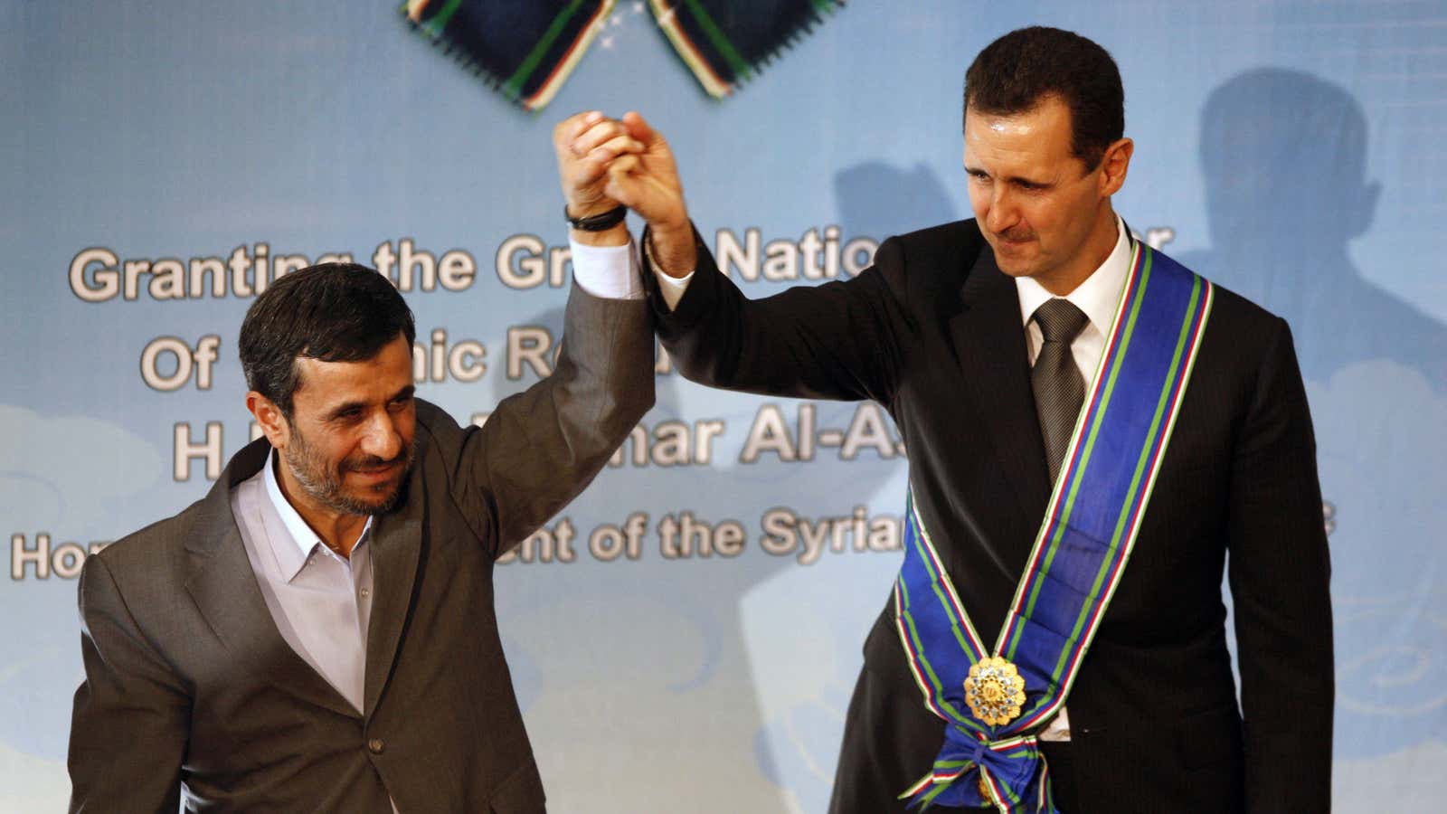 Iran’s Mahmoud Ahmadinejad, left, and Syria’s Bashar Assad