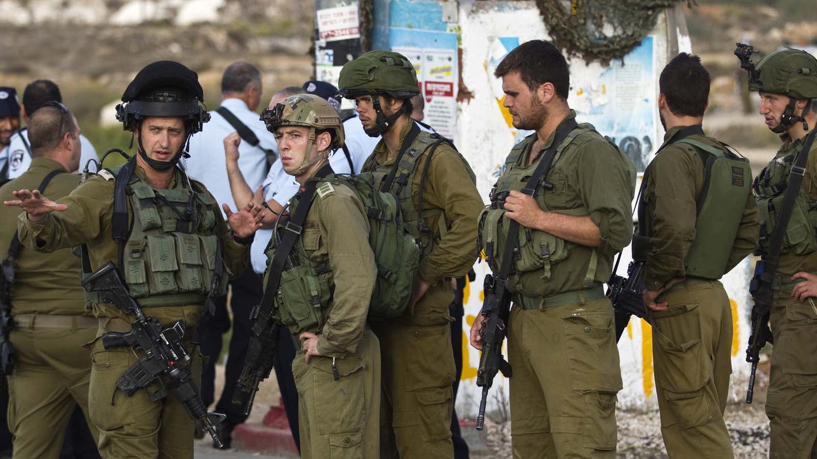 Israeli soldiers at the scene where a Palestinian man allegedly carried out an attack near the West Bank Jewish settlement of Efrat.