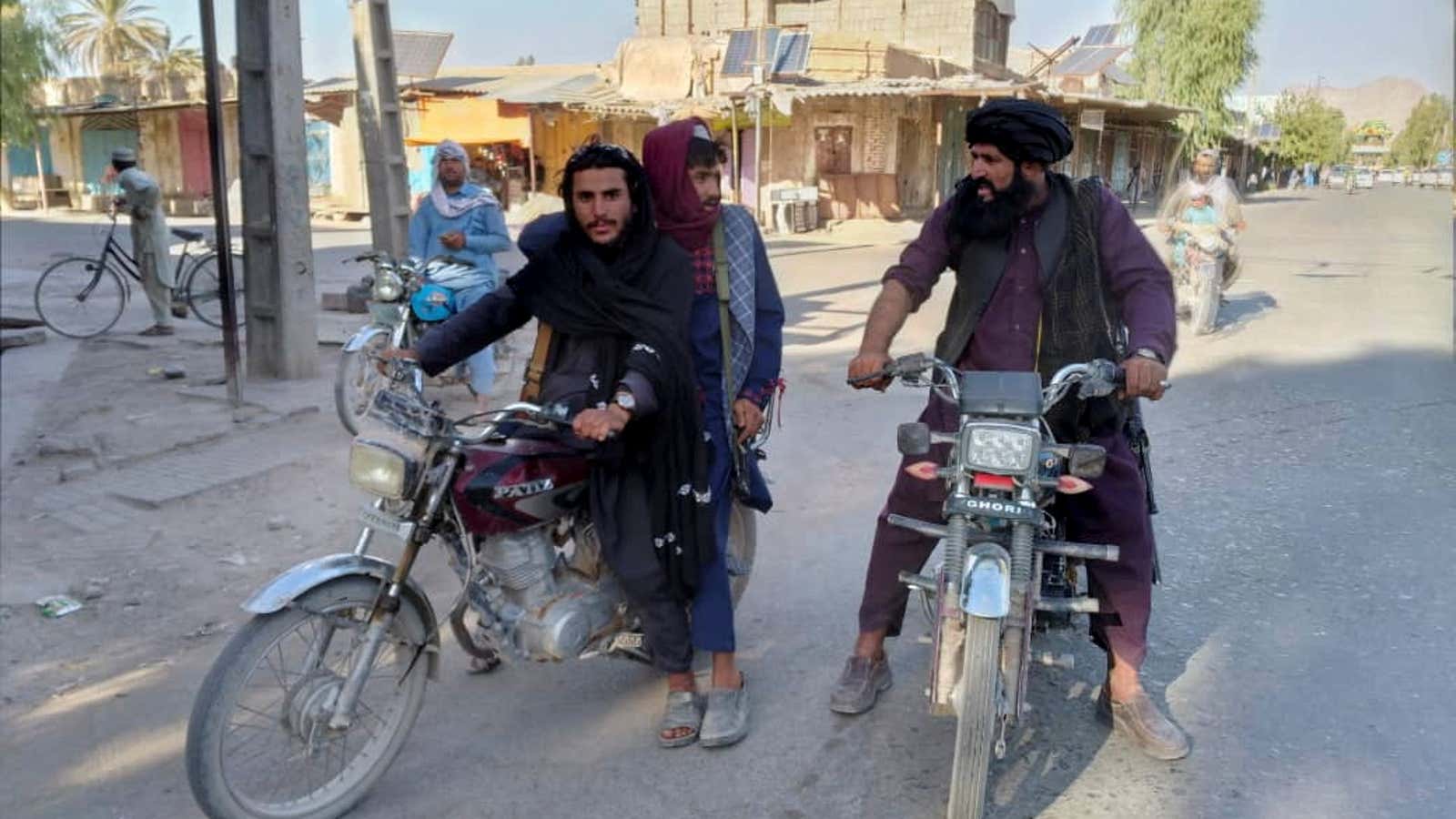 Taliban fighters patrol Farah, Afghanistan