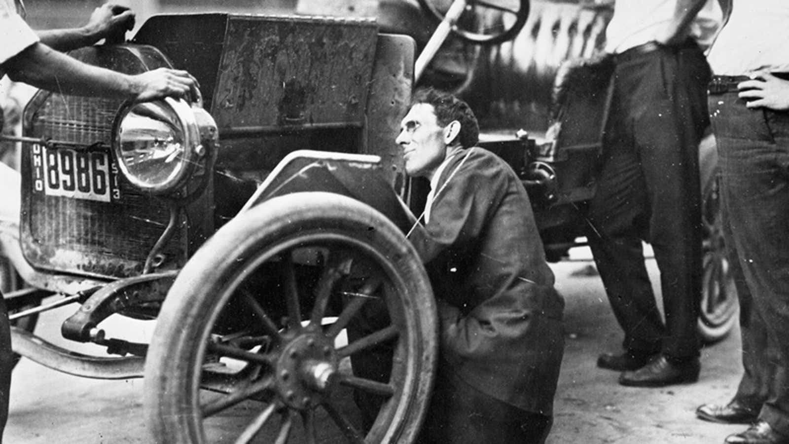 Kettering working on a self-starter on a Buick, one of his early hits, before the myth overtook the man.