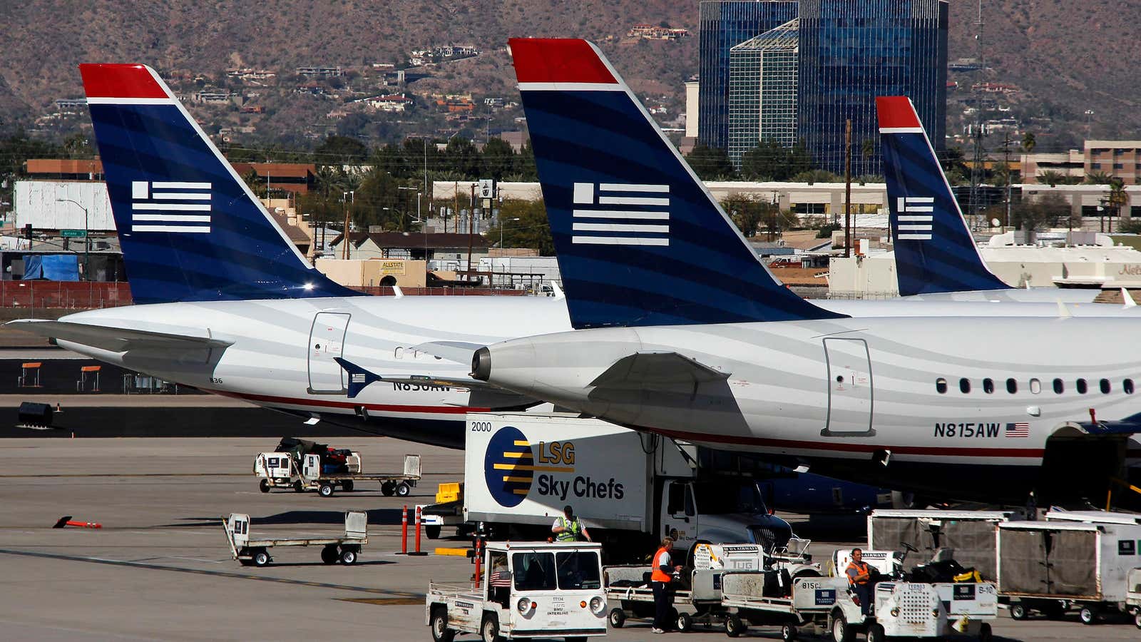 The US Airways-American deal is now stuck on the tarmac.