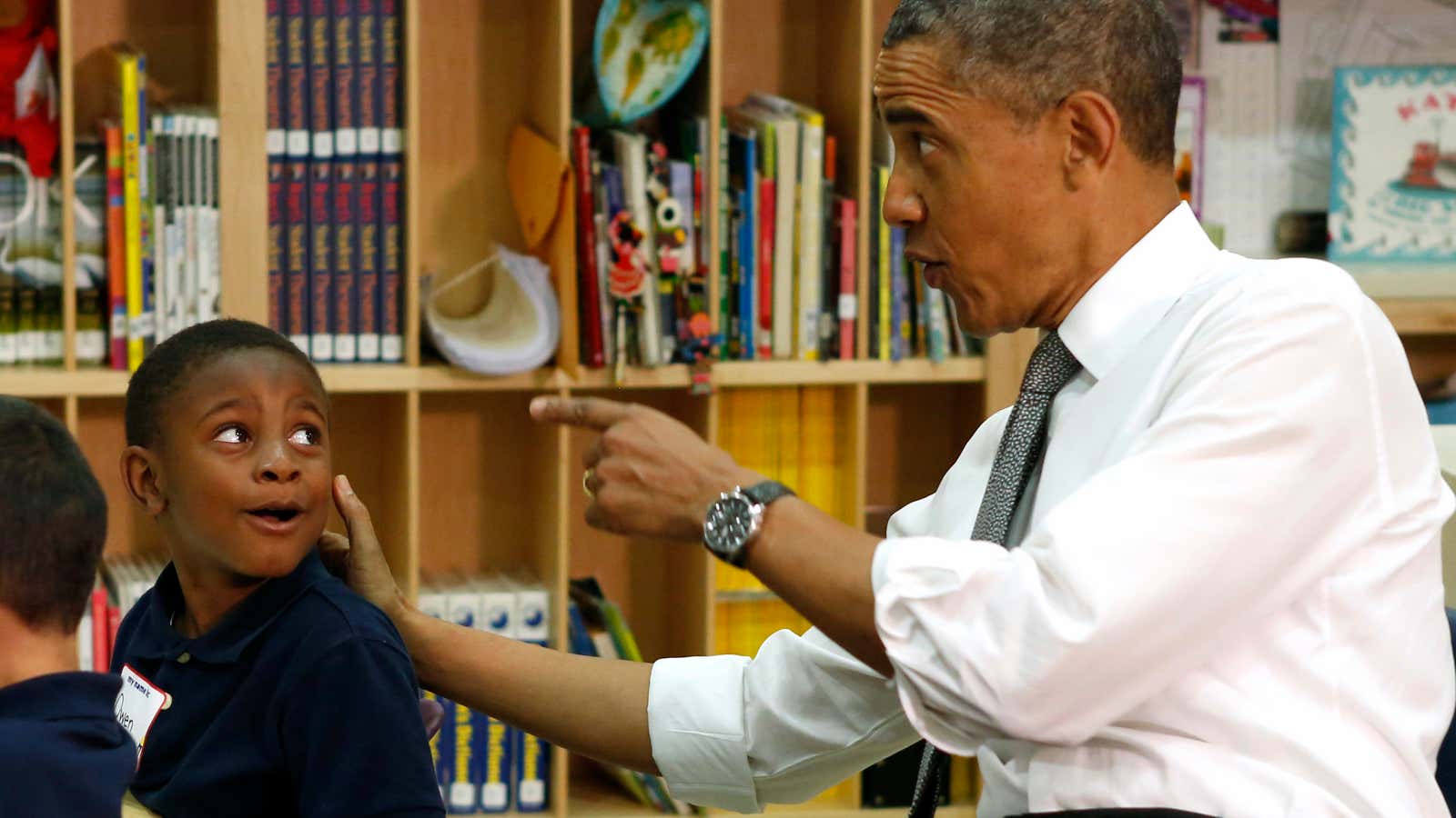U.S. President Barack Obama talks with a pre-kindergarten student at Moravia Park Elementary School during his second ‘Middle Class Jobs and Opportunity Tour’ in Baltimore,…