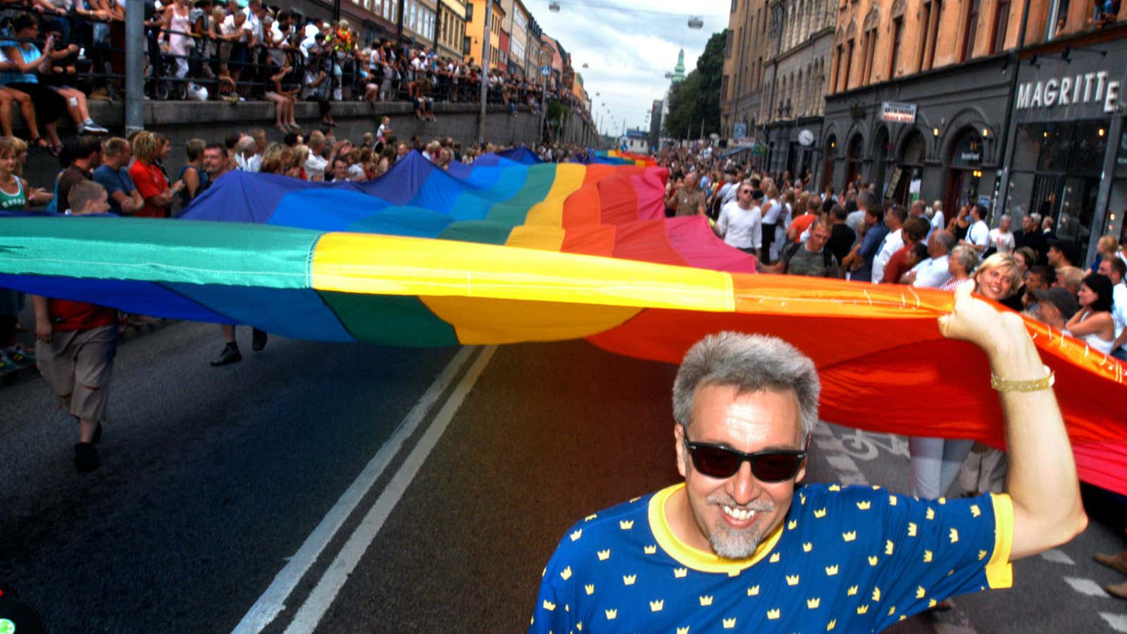 Gilbert Baker, aka “Busty Ross” leading the pack at the Stockholm Pride Festival.