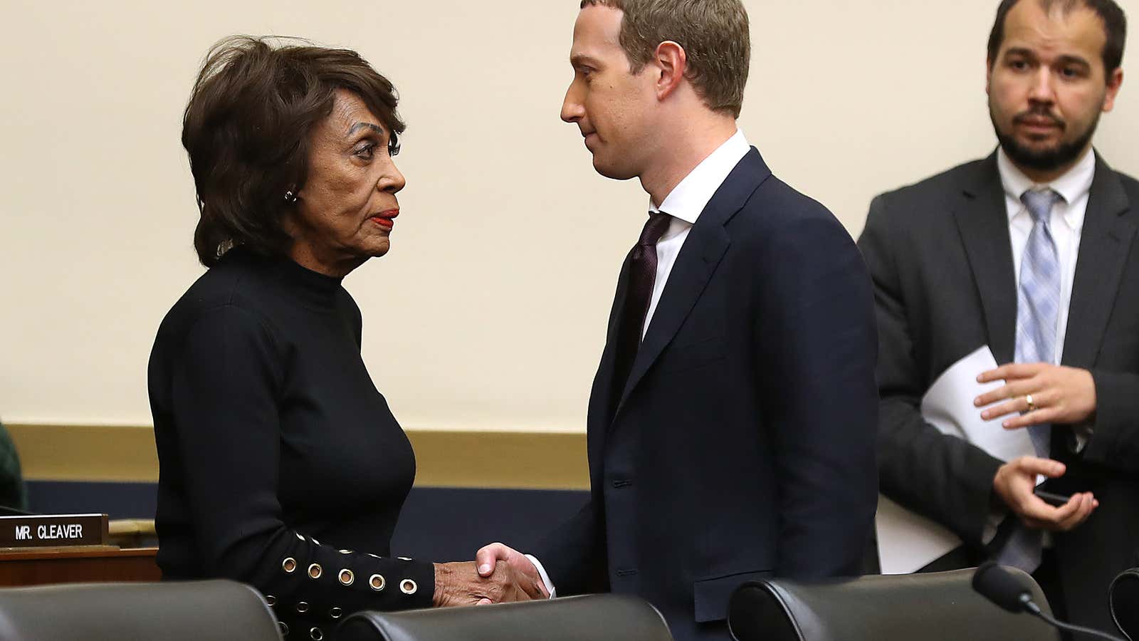 Mark Zuckerberg shakes hands with House Financial Services Committee Chair Maxine Waters (D-Calif.)