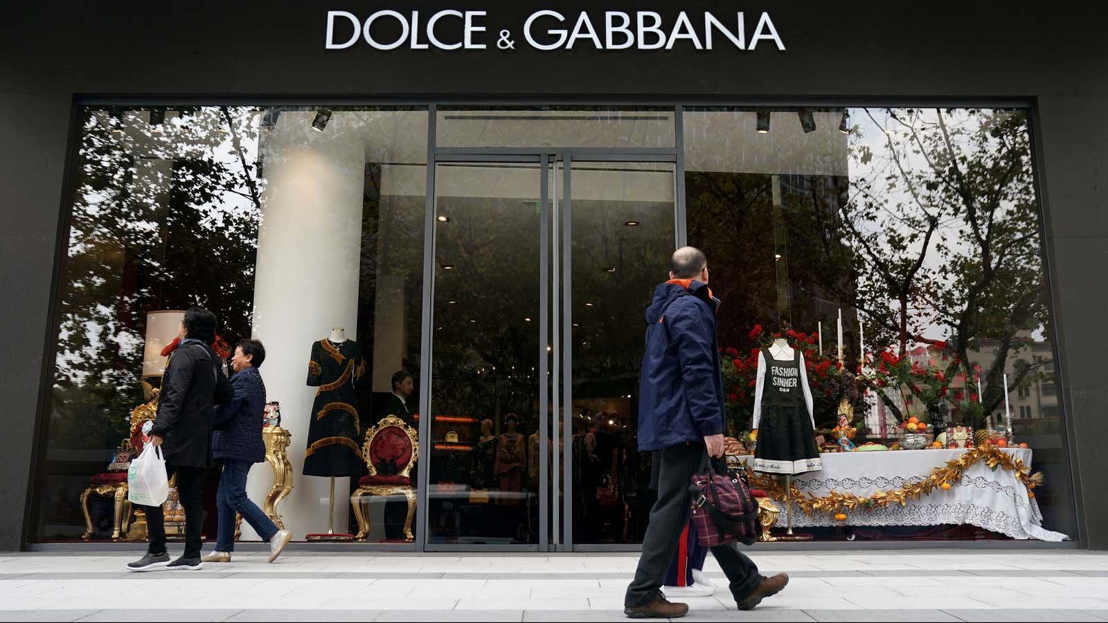 Shoppers are walking right past the Dolce &amp; Gabbana in Shanghai.
