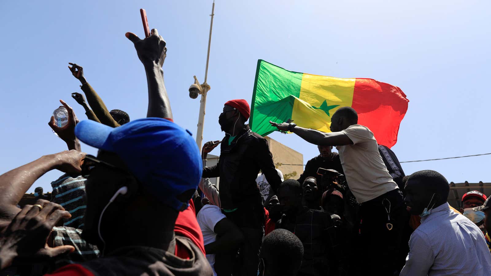 Supporters of opposition leader Ousmane Sonko, who was indicted and released on bail under judicial supervision, attend a demonstration in front of the court in Dakar on March 8.