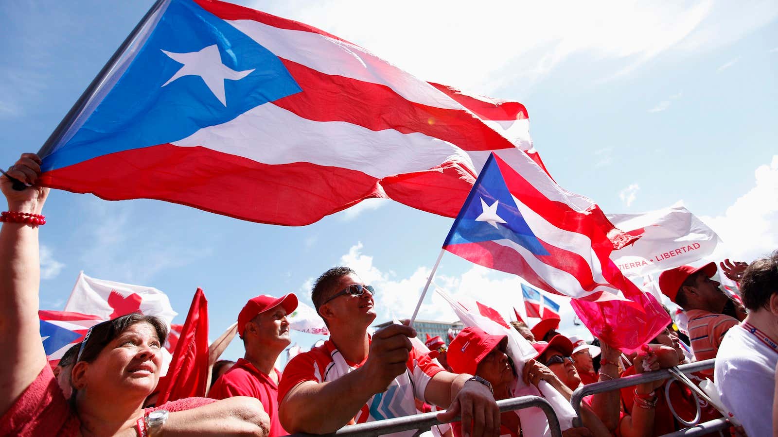 Puerto Ricans rally before a 2012 political status referendum.